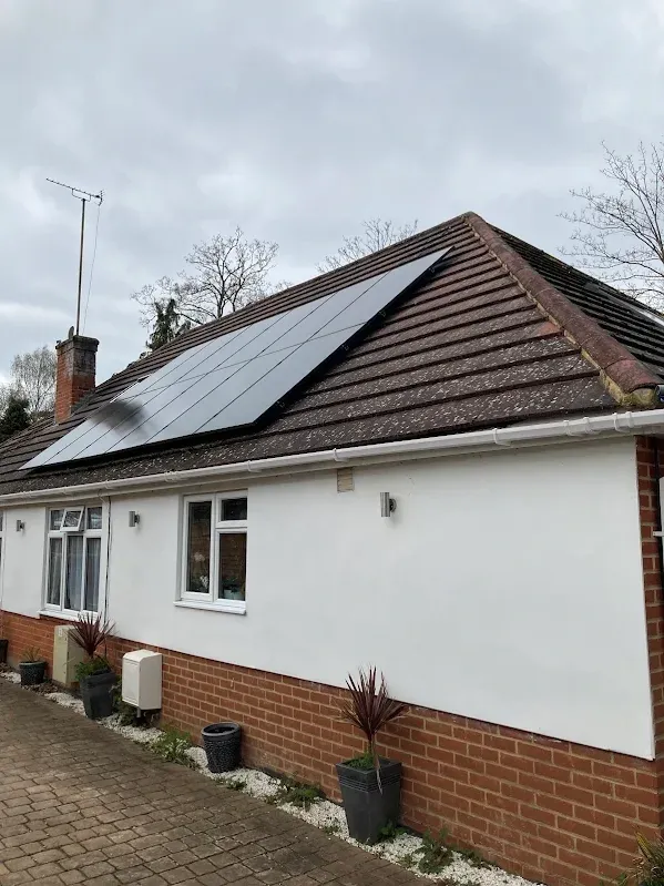 Exterior Painting: Freshly painted white exterior render on a Kent bungalow